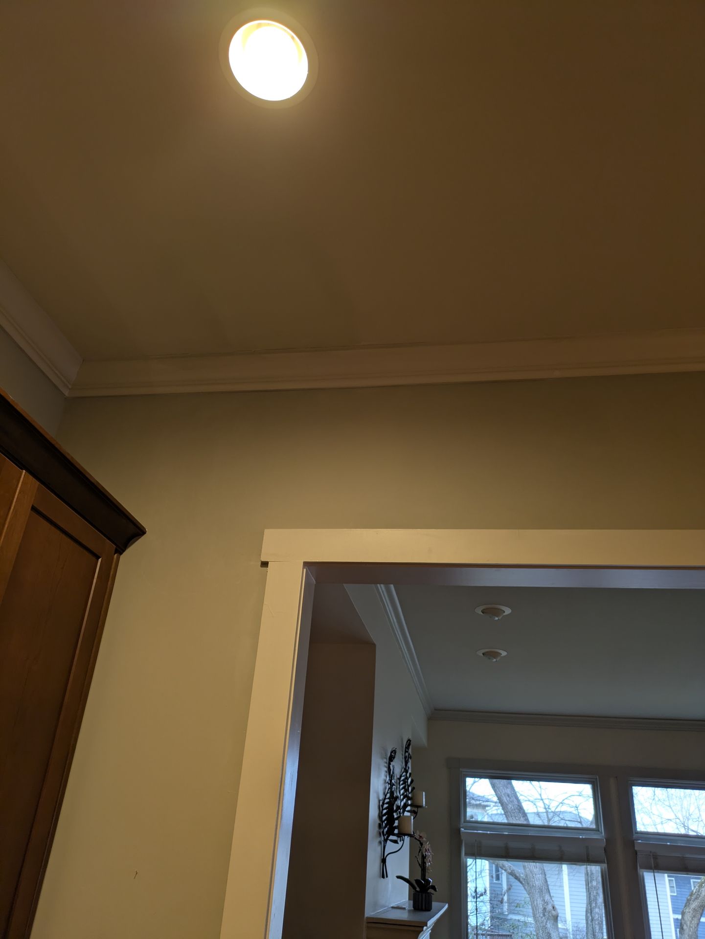 New recessed lighting installed in a bathroom ceiling
